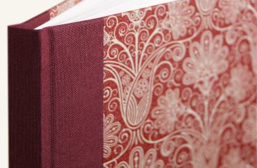 Linen-backed notebook with a hard cover, burgundy with floral Art Nouveau ornaments